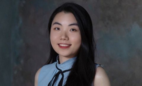 An image of Jiayi. She is smiling for the camera.